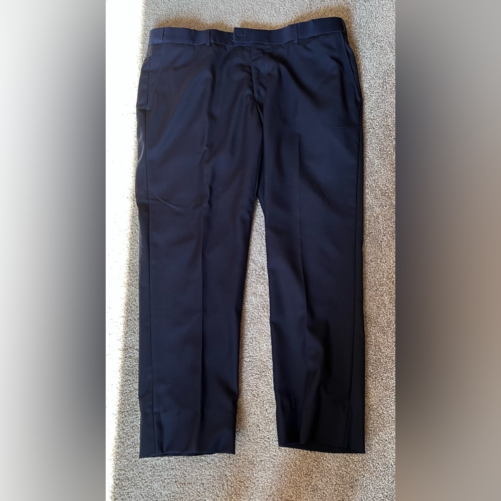 Dark blue men’s dress pants. Trim fit